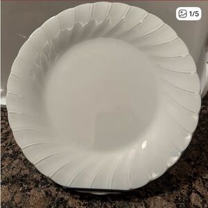 Three Sheffield Bone China plates.